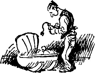 Man standing by baby cradle