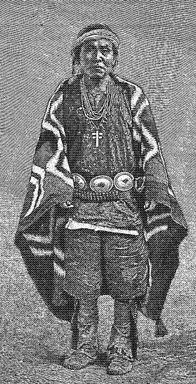 Pl. XX. NAVAJO INDIAN WITH SILVER ORNAMENTS. Pl. XX. NAVAJO INDIAN WITH SILVER ORNAMENTS.