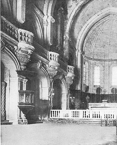 THE INTERIOR HAS A SHALLOW, GRACEFULLY BALUSTRADED BALCONY