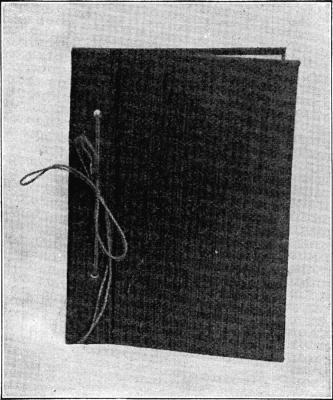 SCRAP OR CLIPPING BOOK  Cover of grass cloth. SCRAP OR CLIPPING BOOK  Cover of grass cloth.