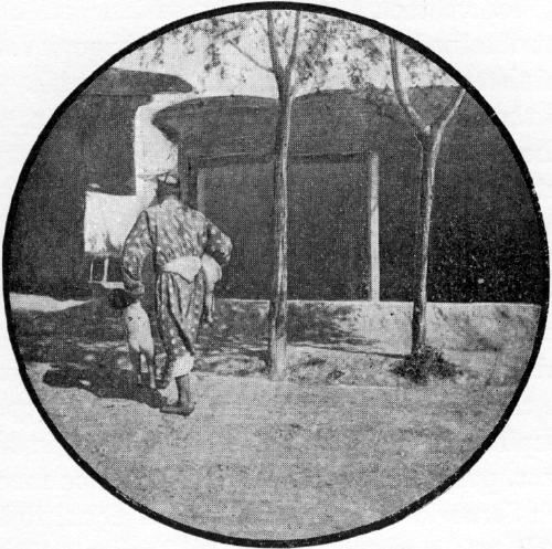 A SART RESCUING HIS CHILDREN FROM THE CAMERA OF THE “FOREIGN DEVILS.” A SART RESCUING HIS CHILDREN FROM THE CAMERA OF THE 'FOREIGN DEVILS.'