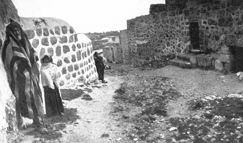IN A STREET IN BETHANY A LOCAL GUIDE WAS WAITING. IN A STREET IN BETHANY A LOCAL GUIDE WAS WAITING.