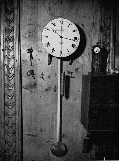 Figure 28. Figure 28.—Detail of wall of Bertolla's workshop, with regulatory clock made by his nephew, Alessandro Bertolla of Venice. Note wheel layouts, etc., scribed in the paneling. (Courtesy of Museo Nazionale della Scienza e della Tecnica, Milan.)