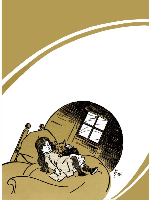 Dorothy and Toto on a bed Dorothy and Toto on a bed