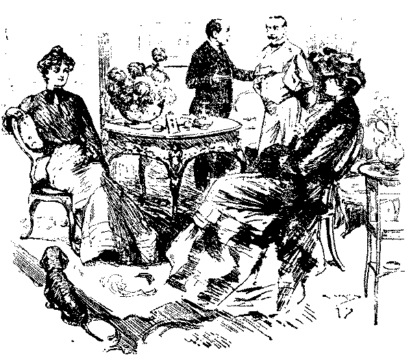 Ladies talking round a table.