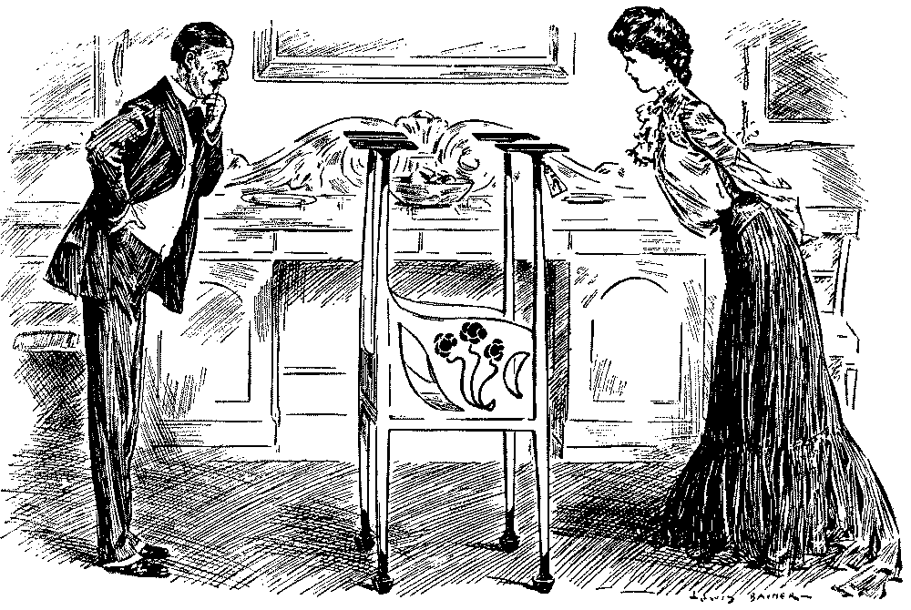 Man and woman viewing a work of art.